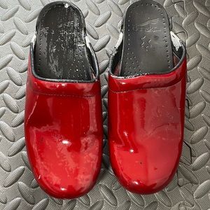 Slide on Dansko, genial used as you can see but still I. Good shape.